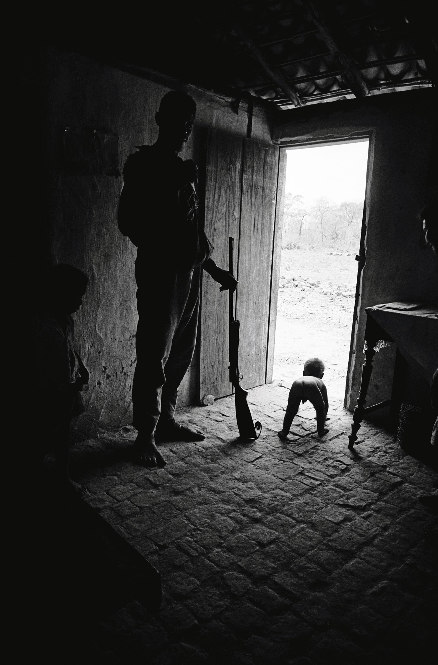 Gente em suas casas perto de Lassance, c. 1966
